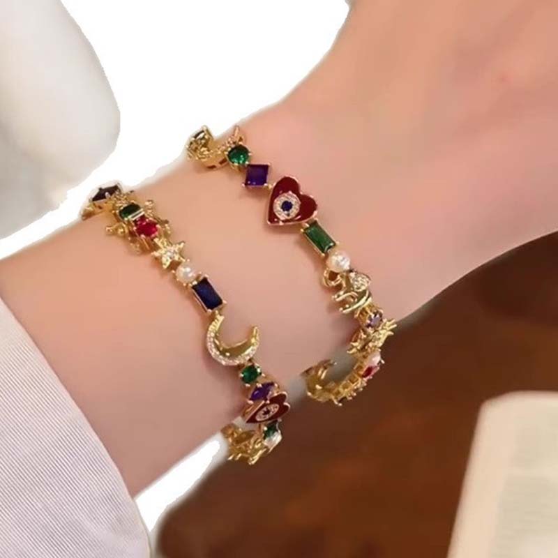 💫 LIMITED-TIME 50% RABATT +  2 kaufen 1 gratis! ✨ Himmelscharme-Armband – Sonne, Mond, Sterne, Kristalle, Goldton 🪐